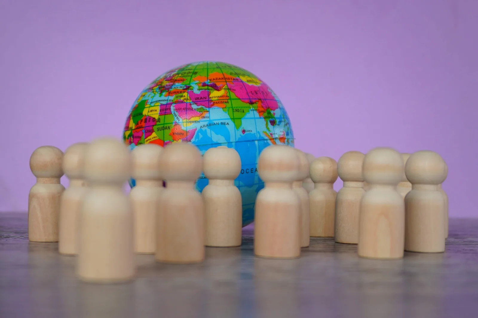 Wooden dolls and earth globe.