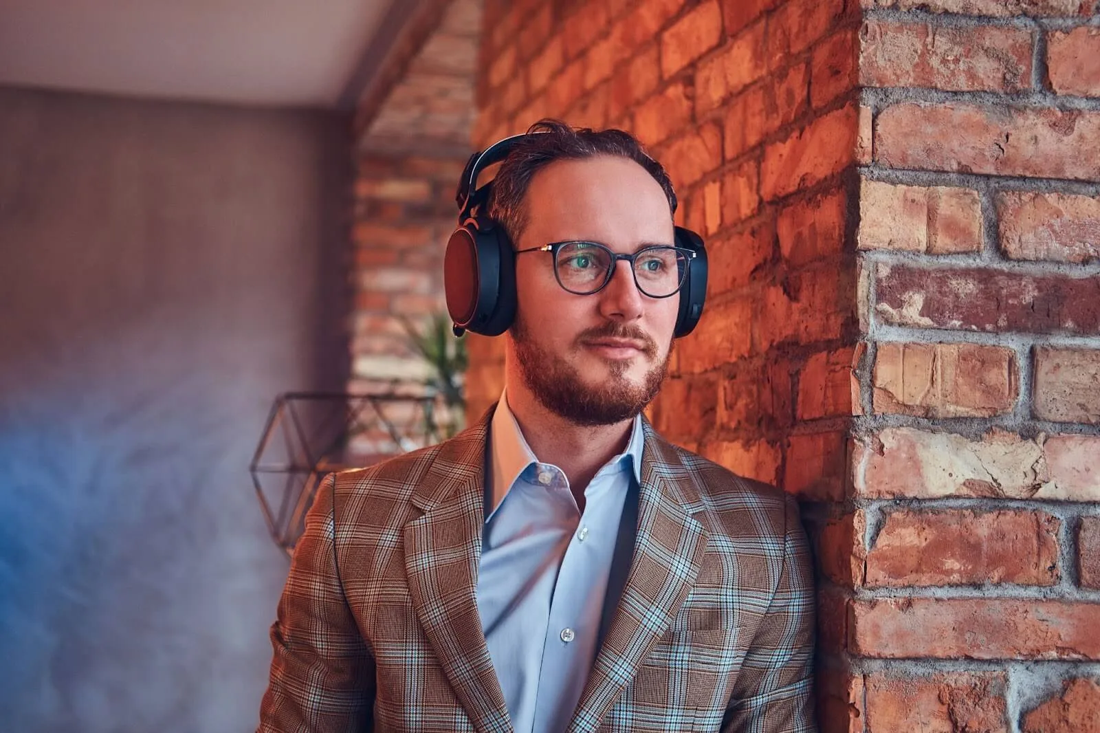 male media or radio rep listening to an ai-powered spec spot created by spoton