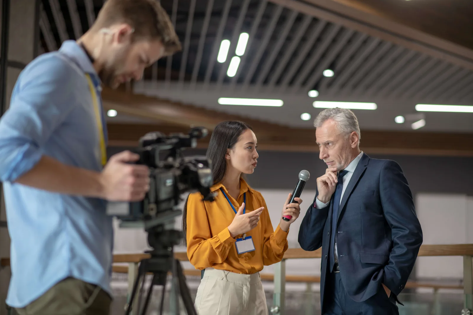 Journalist interviewing local business person