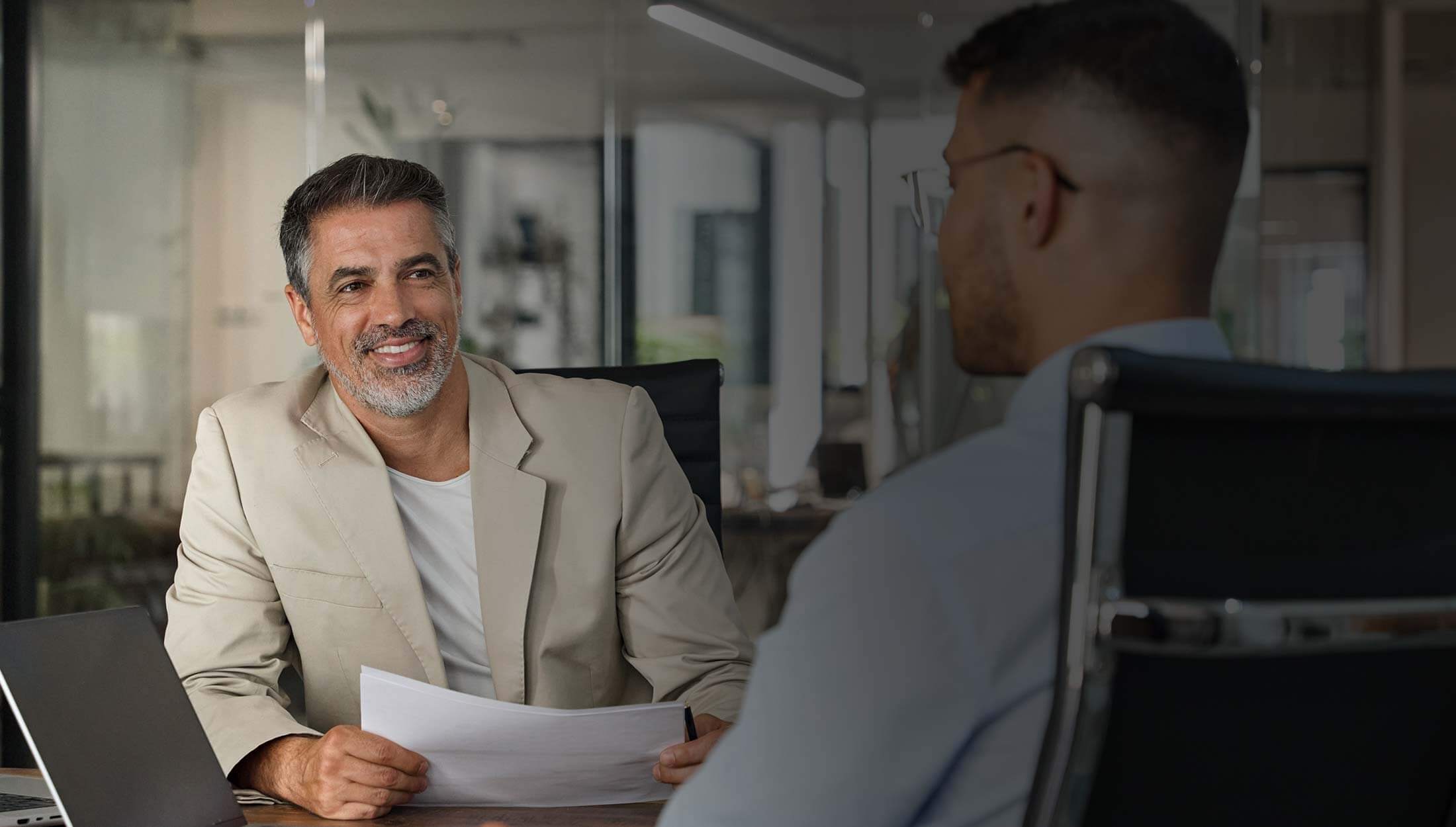 media-sales2-stock-photo-financial-advisor-professional-bank-manager-consulting-business-man-working-on-laptop-in-office-2440437471-2