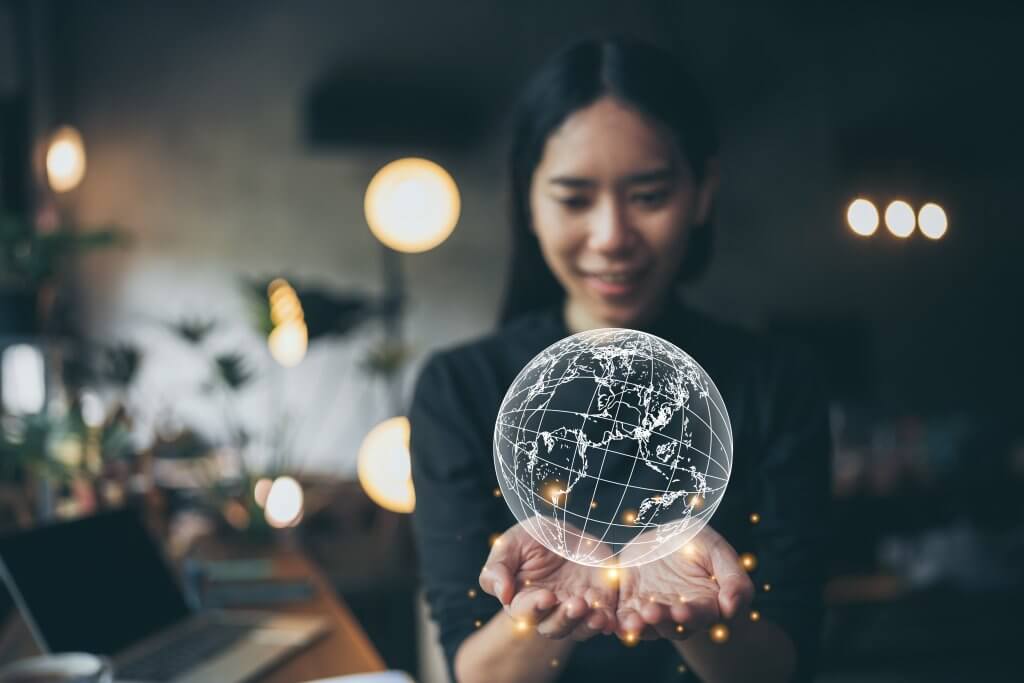 woman person lifestyle to relax at home, happy and smile with world projected in her hand