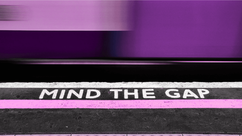 Purple train passing platform marked 'Mind the Gap', symbolizing missed innovation opportunities